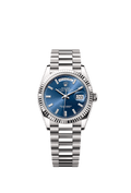 Rolex - Day-Date 36 White Gold - Fluted / Bright Blue - Baguette / President — Ref. 128239