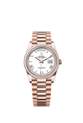 Rolex - Day-Date 36 Everose Gold - Baguette / White - Roman / President — Ref. 128395TBR