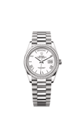Rolex - Day-Date 36 White Gold - Baguette / White - Roman / President — Ref. 128399TBR
