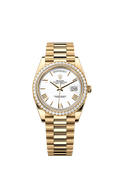 Rolex - Day-Date 40 Yellow Gold / Baguette / White Roman — Ref. 228348RBR