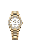 Rolex - Day-Date 40 Yellow Gold / Baguette / Silver Roman — Ref. 228398TBR